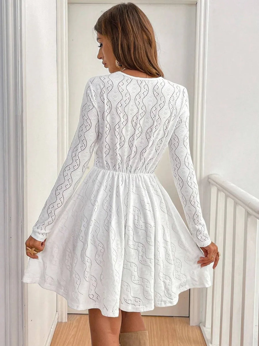 Selene Lace Detail V Neck Long Sleeve Mini Dress styled in the studio