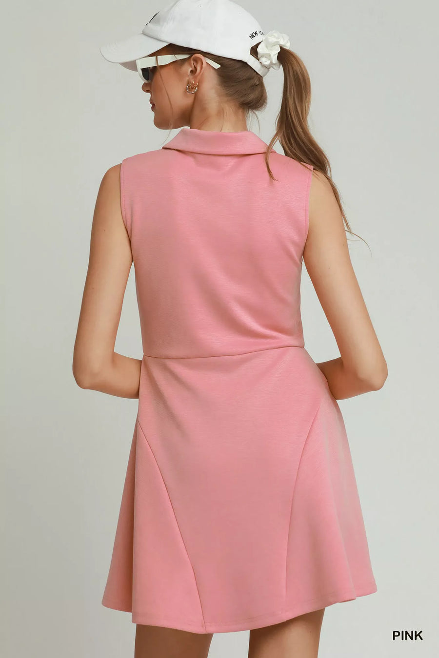 Nike Umgee Collared Quarter Zip Tennis Dress styled in the studio