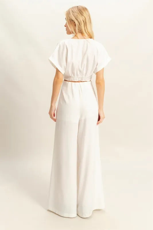 Maat Twisted Front Short Sleeve Top and Wide Leg Pants Set styled in the studio