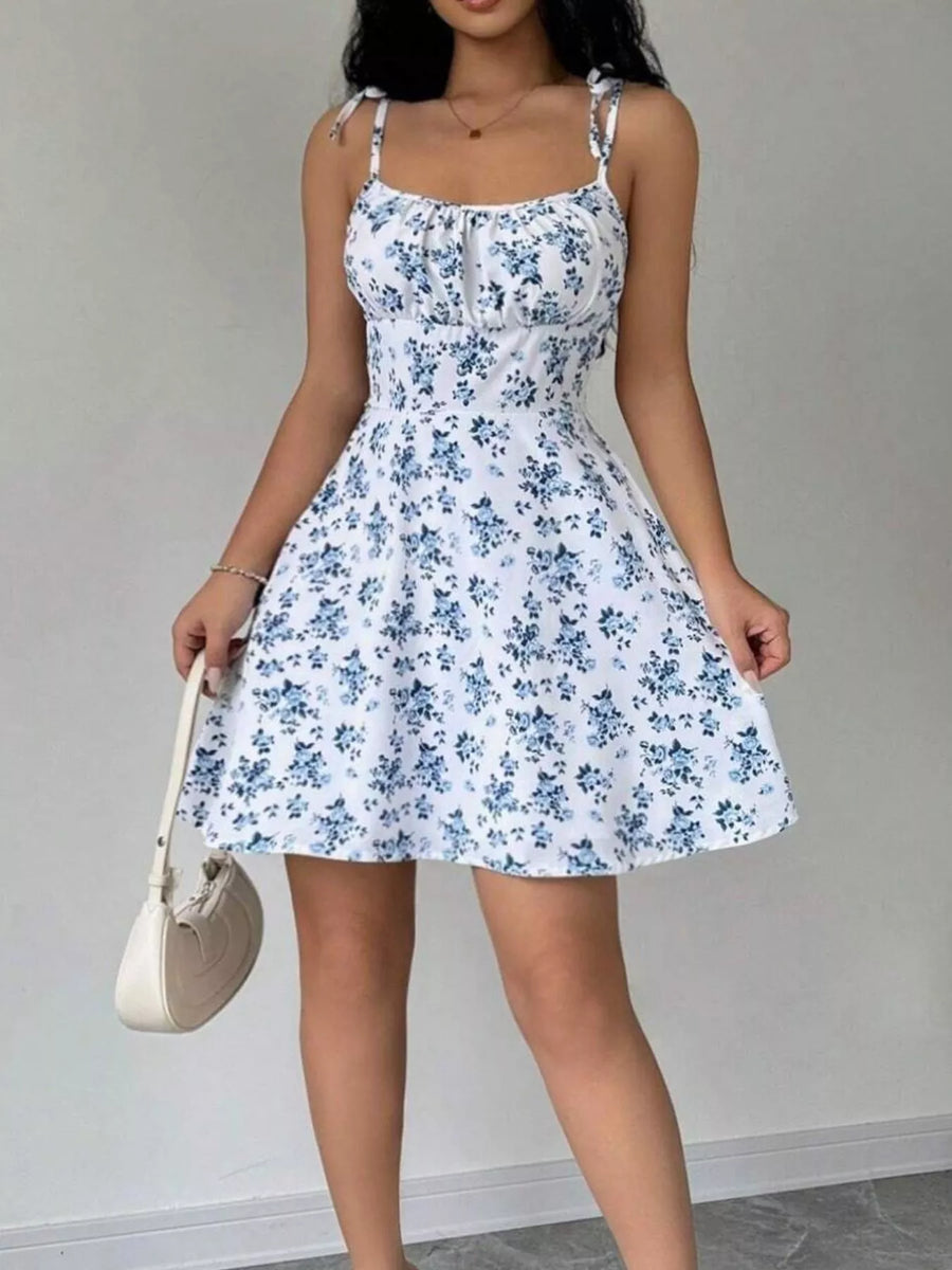 Olwen Floral Print Spaghetti Strap A-Line Mini Dress styled in the studio