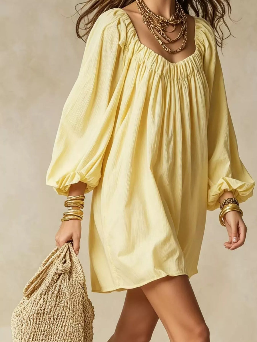 Oshun Flowy Balloon Sleeve Mini Dress styled in the studio