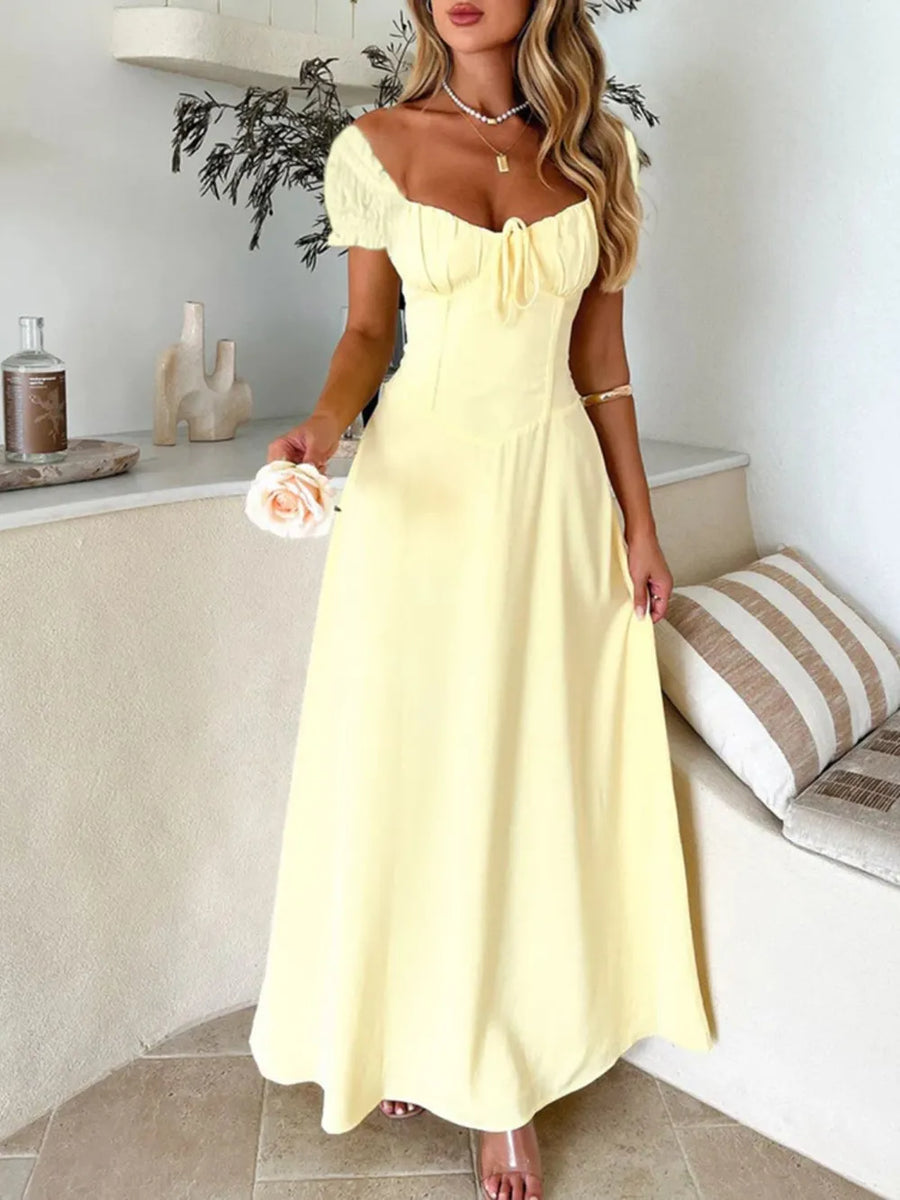 Oshun Sweetheart Neck Short Sleeve Maxi Dress styled in the studio