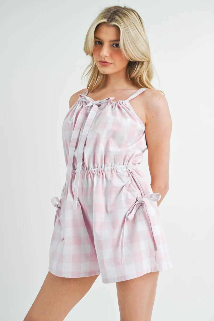 Fortuna Plaid Sleeveless Button Down Romper styled in the studio